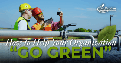 Two men working in water treatment.